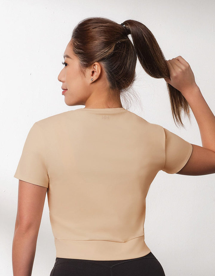 HOW- EFFORTLESS Slim Fit Yoga Short Sleeve Cross Crop Top Tops Her own words SPORTS Tapioca S 