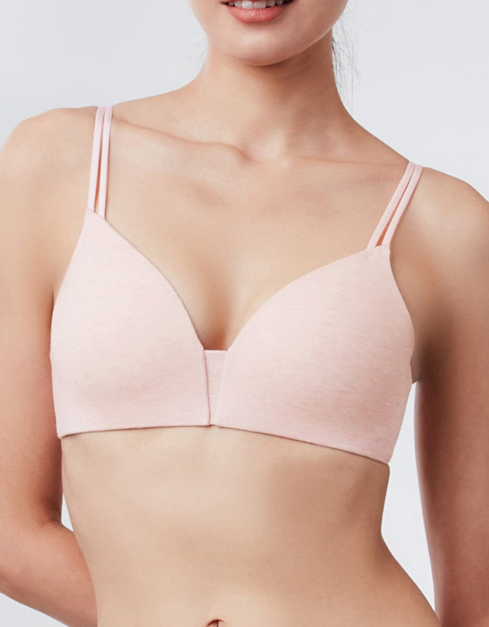 Her own words ORGANIC COTTON AIRY Non Wired Bra. A sustainable, wireless bra featuring breathable REmatrixpad™ technology, crafted from a soft organic cotton and modal blend for all-day comfort.